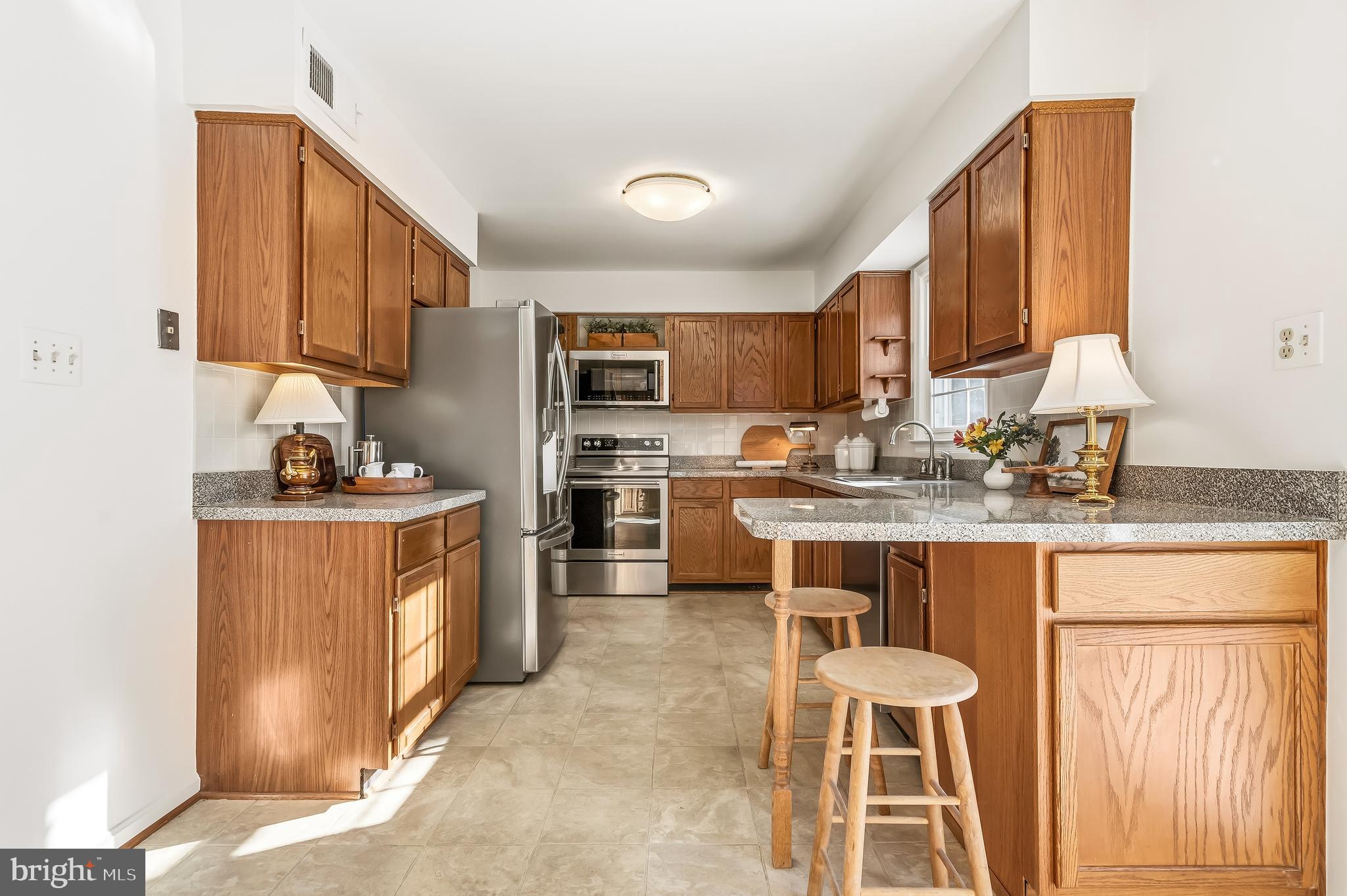 7433 Spring Tree Drive Springfield, VA 22153 - Photo 19 of 63 Countertop Space for Cooking and Entertaining