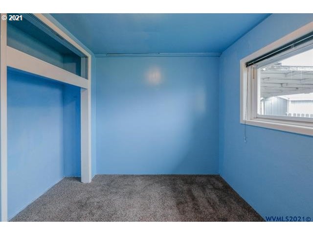 34415 Bond Road Lebanon, OR 97355 - Photo 15 of 32 a view of an empty room with a window