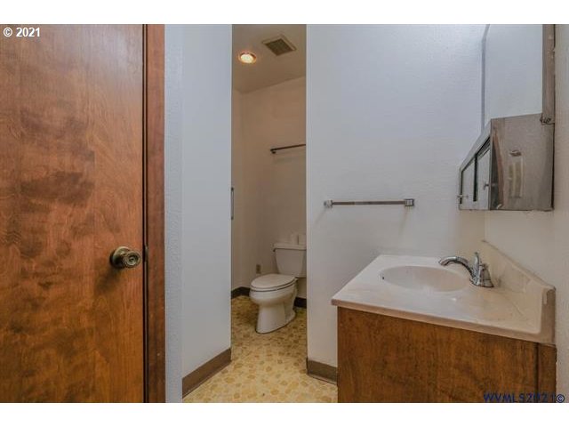 34415 Bond Road Lebanon, OR 97355 - Photo 18 of 32 a bathroom with a sink and a toilet