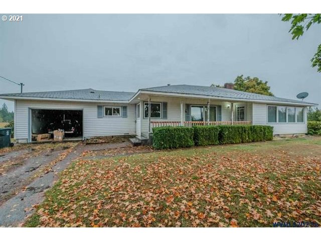 34415 Bond Road Lebanon, OR 97355 - Photo 28 of 32 a view of a house with a patio