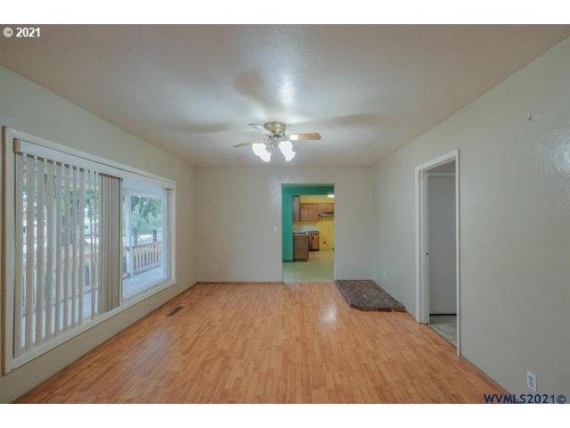 34415 Bond Road Lebanon, OR 97355 - Photo 5 of 32 a view of an empty room with a window