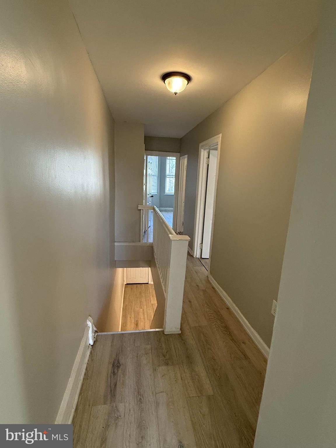 4843 Palethorp Street Philadelphia, PA 19120 - Photo 3 of 16 wooden floor in an empty room with a window