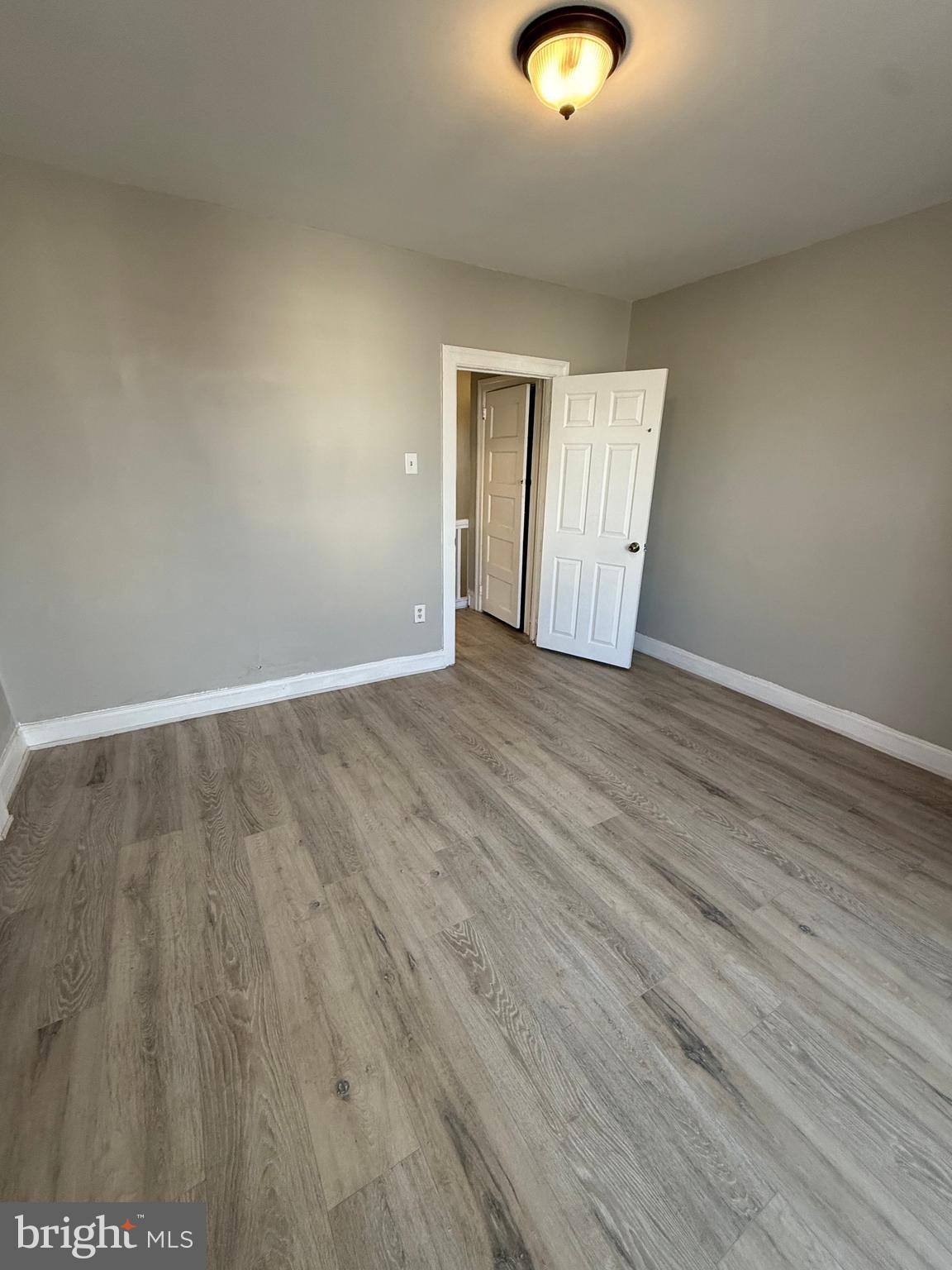 4843 Palethorp Street Philadelphia, PA 19120 - Photo 9 of 16 a view of an empty room with wooden floor