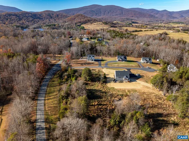 a view of a lake with mountains in the background