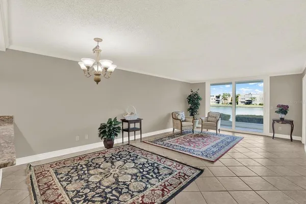 a living room with a rug