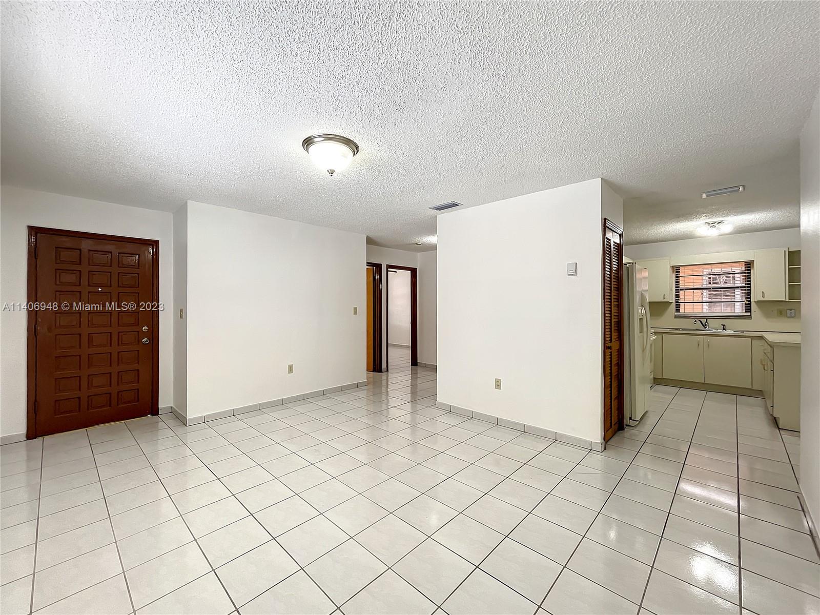 1435 West 40th Street Hialeah, FL 33012 - Photo 3 of 19 a view of a kitchen with a sink