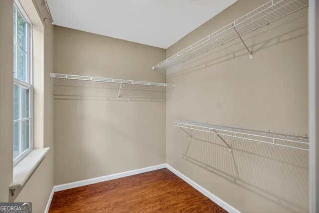 a view of a room with racks on the wall