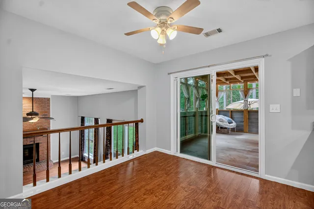 a view of livingroom with furniture window and wooden floor