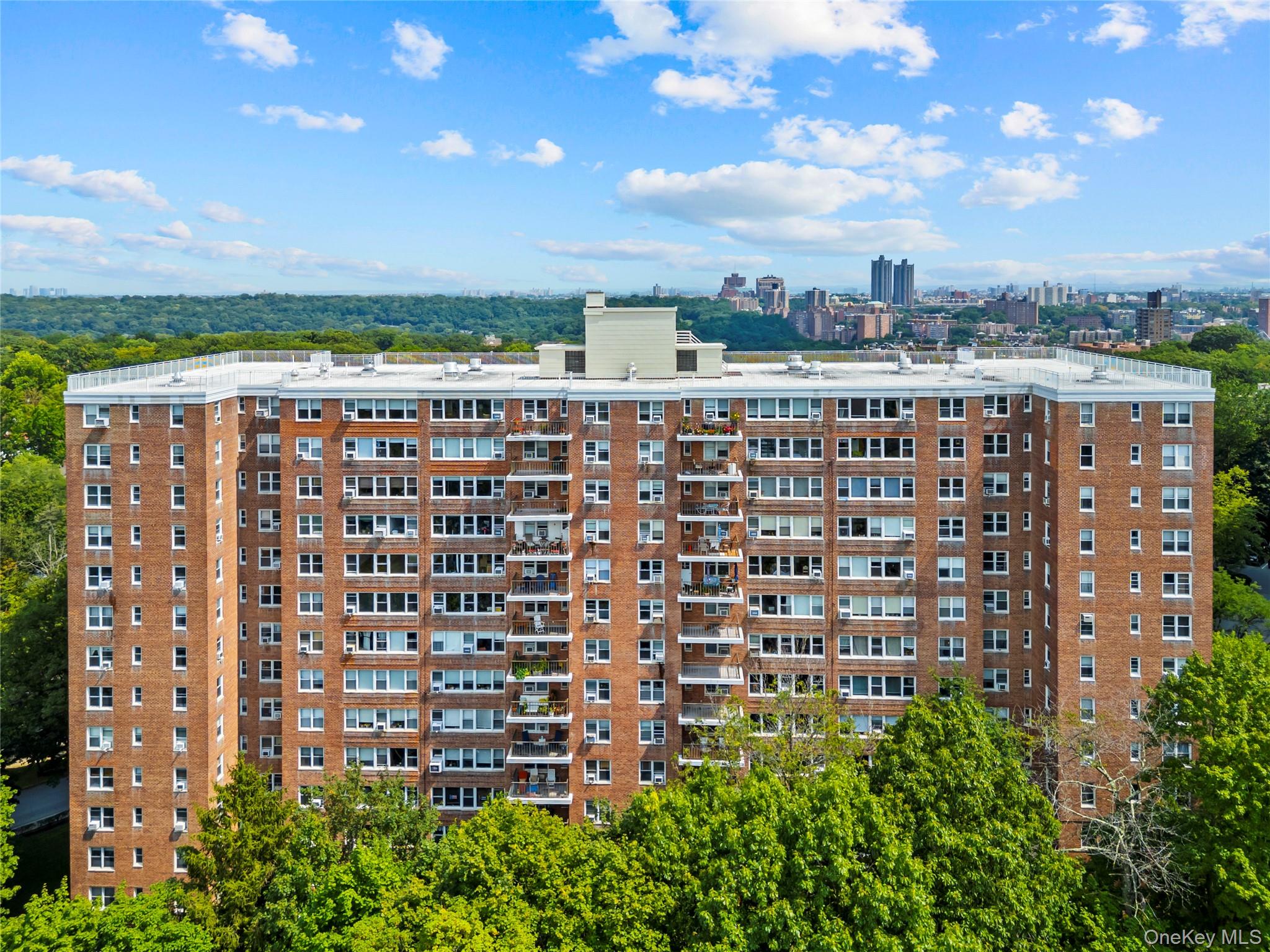 4555 Henry Hudson Parkway West, Unit A908 Bronx, NY 10471 - Photo 12 of 12 a view of a city with tall buildings