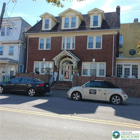 a car parked in front of a building