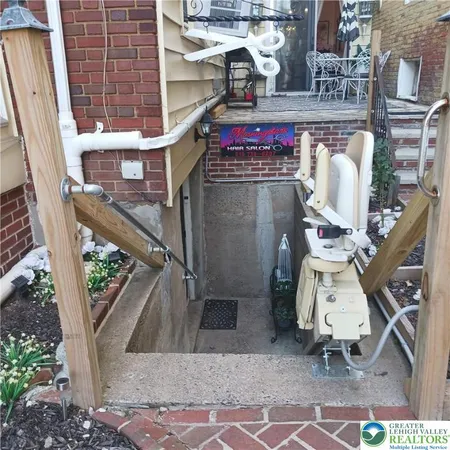 a front view of a house with outdoor space