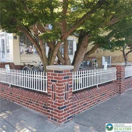 a view of a porch with a bench