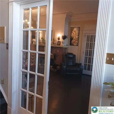 a view of living room with furniture and a window