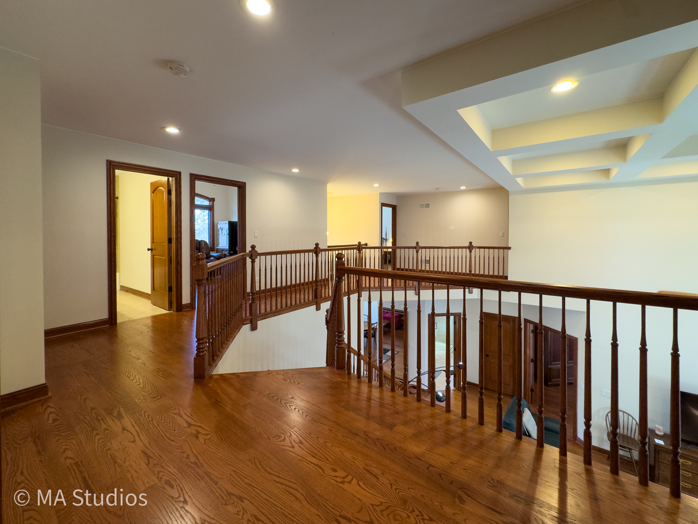 9030 Elm Avenue Burr Ridge, IL 60527 - Photo 29 of 72 a view of a hallway with wooden floor