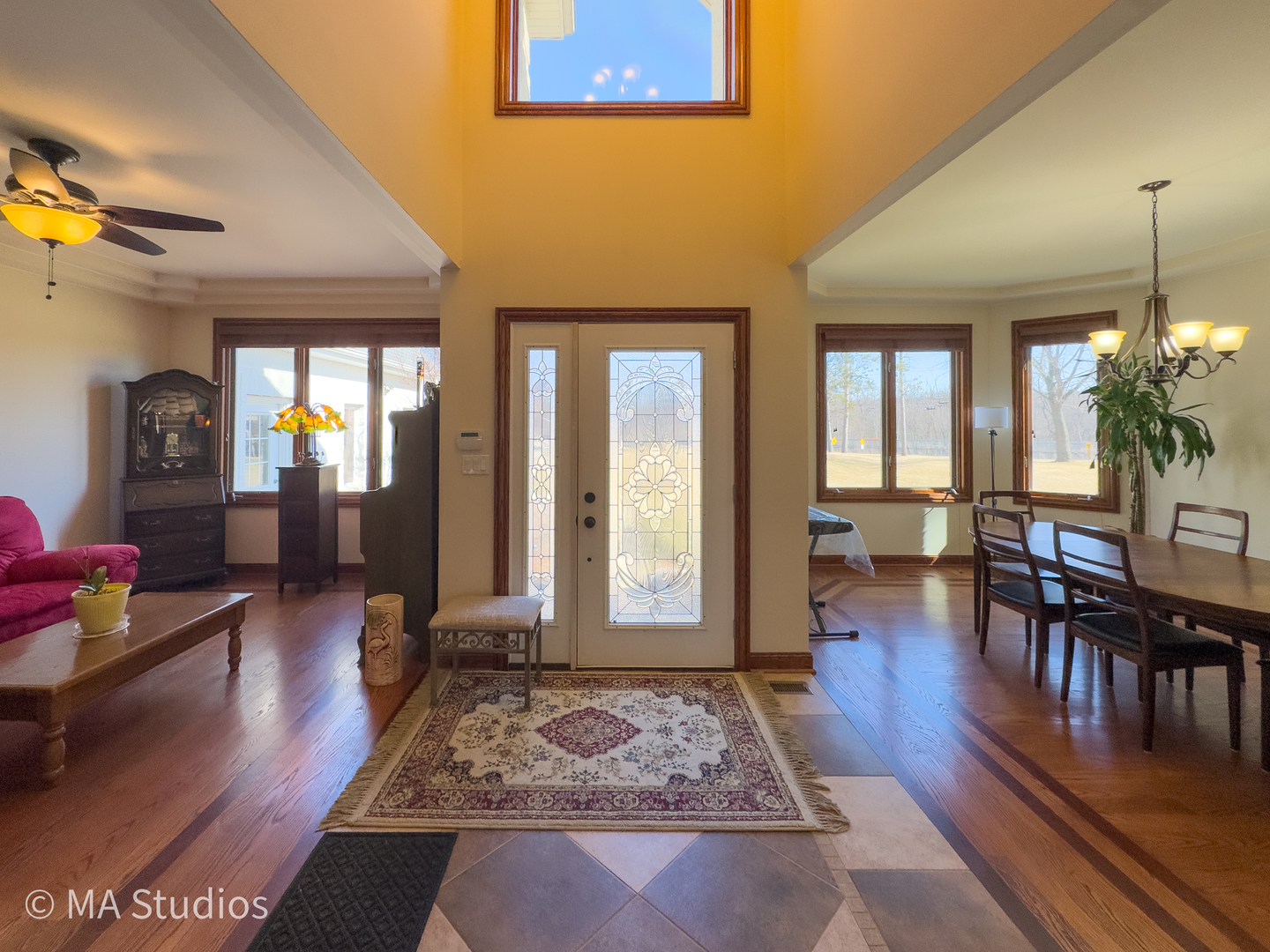 9030 Elm Avenue Burr Ridge, IL 60527 - Photo 4 of 72 a living room with furniture and a rug