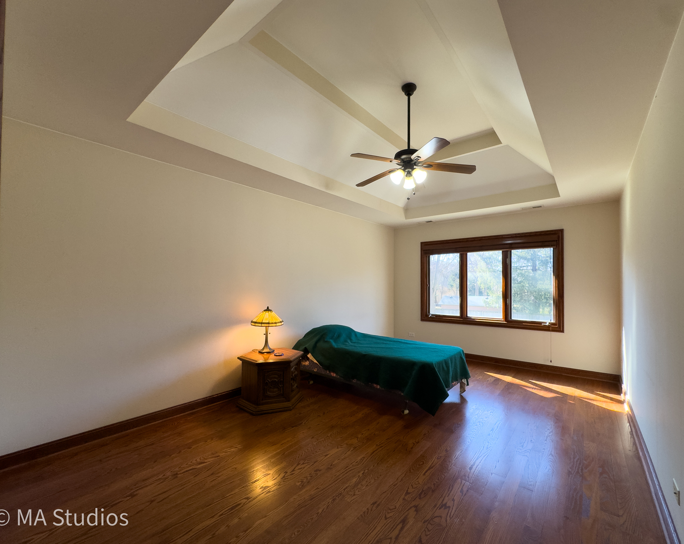9030 Elm Avenue Burr Ridge, IL 60527 - Photo 41 of 72 a living room with hard wood floors and a window
