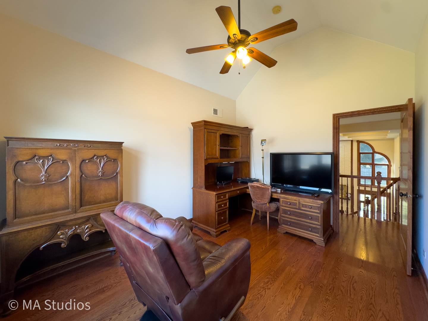 9030 Elm Avenue Burr Ridge, IL 60527 - Photo 45 of 72 a living room with furniture and a flat screen tv