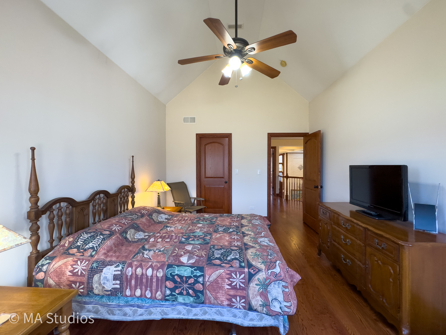 9030 Elm Avenue Burr Ridge, IL 60527 - Photo 48 of 72 a bedroom with a bed and a flat screen tv