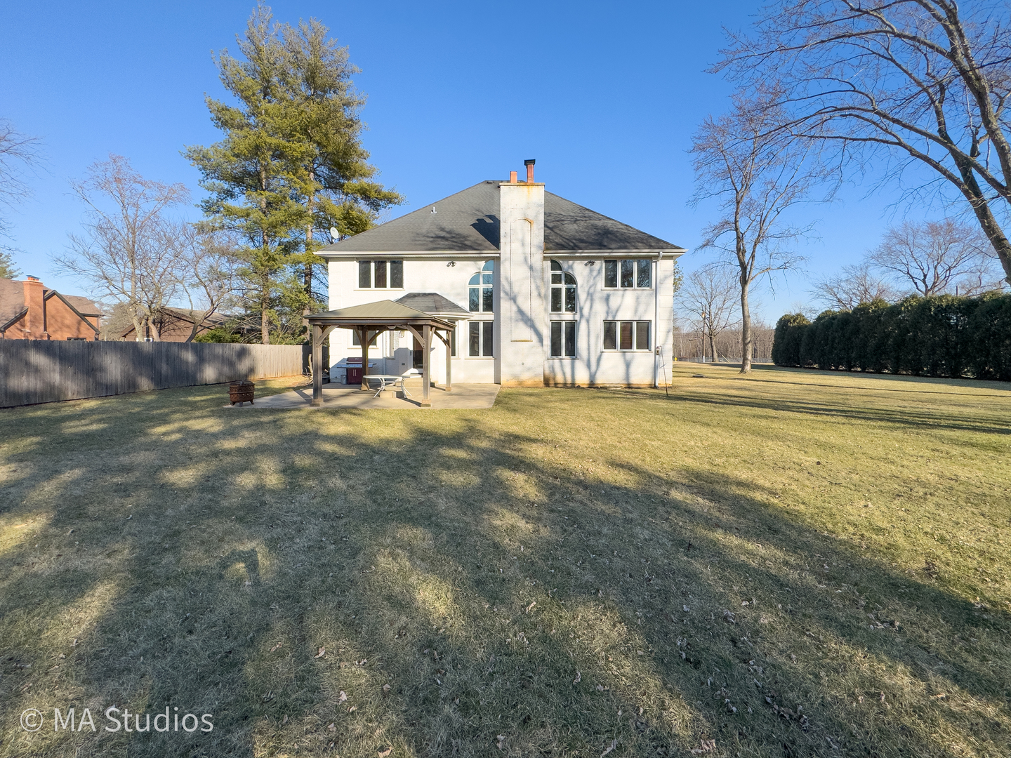 9030 Elm Avenue Burr Ridge, IL 60527 - Photo 58 of 72 a front view of a house with a yard