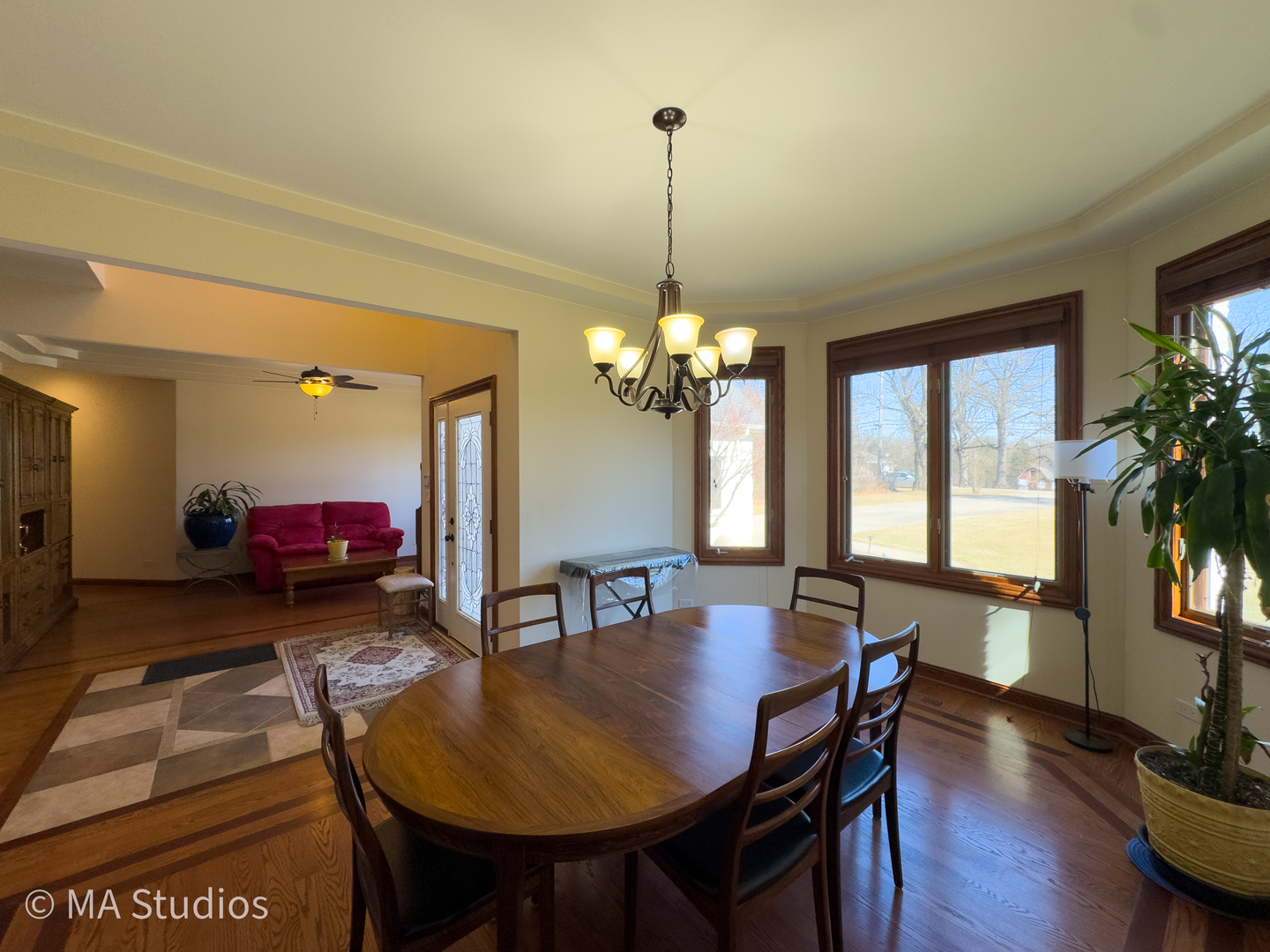 9030 Elm Avenue Burr Ridge, IL 60527 - Photo 7 of 72 a view of a dining room with furniture window and wooden floor