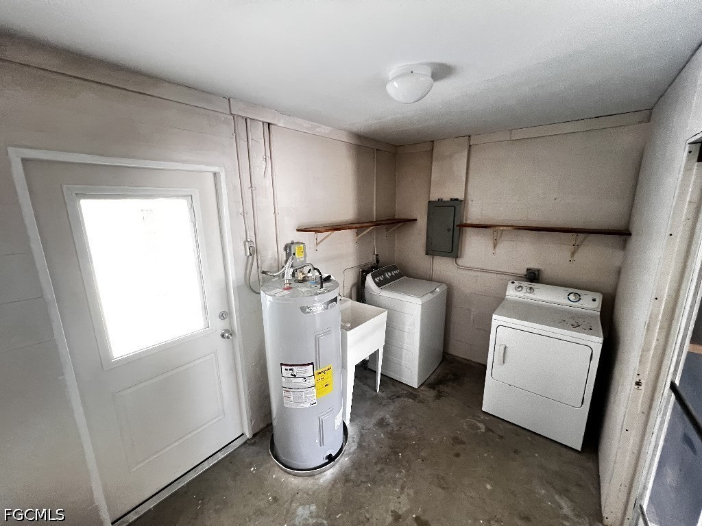 144 Whidden Road North Fort Myers, FL 33917 - Photo 16 of 16 a utility room with dryer and washer
