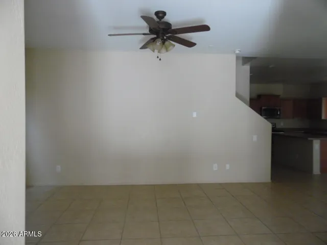a view of entryway and kitchen