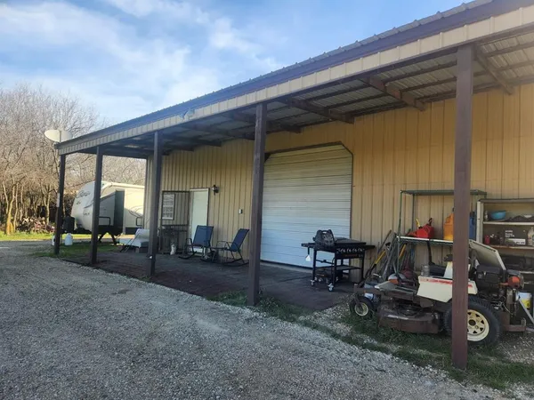 a view of a porch with furniture