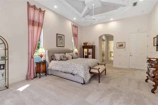 a balcony with chairs and a table