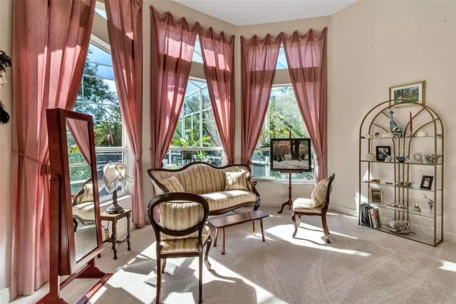 a spacious bathroom with a double vanity sink mirror and bathtub
