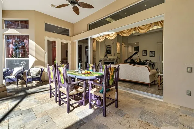 a kitchen with a sink window and cabinets