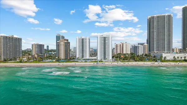 a view of a city with tall buildings