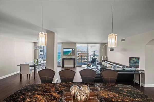 a view of a dining room with furniture