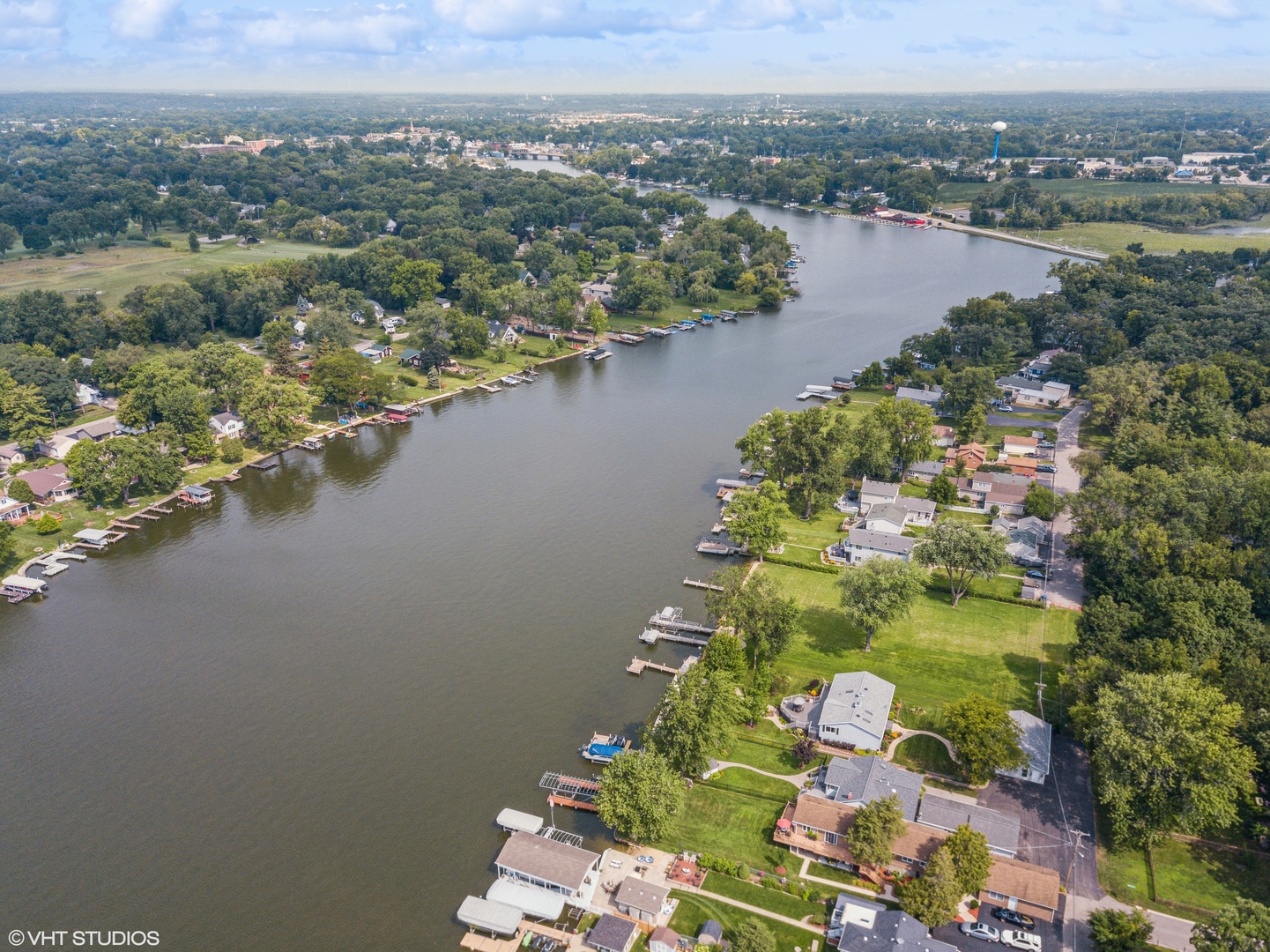 307 North Emerald Drive McHenry, IL 60051 - Photo 22 of 34 an aerial view of lake and residential houses with outdoor space