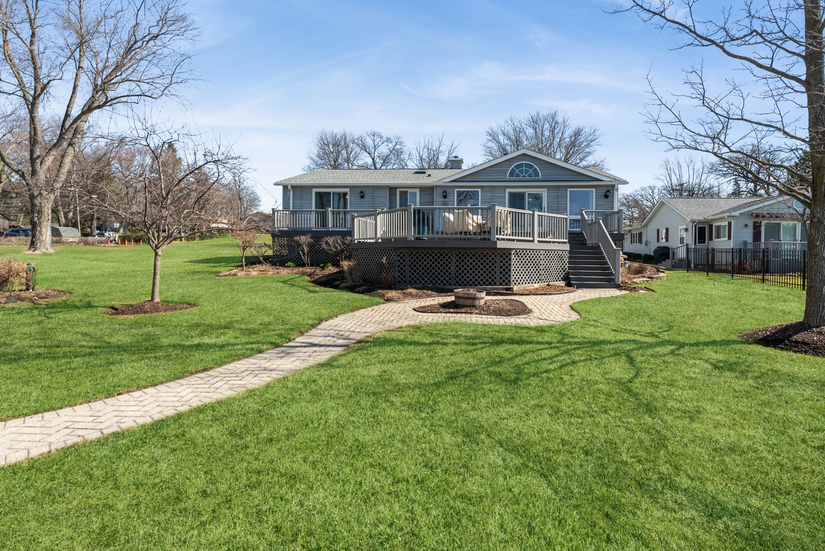 307 North Emerald Drive McHenry, IL 60051 - Photo 3 of 34 a front view of house with yard and green space