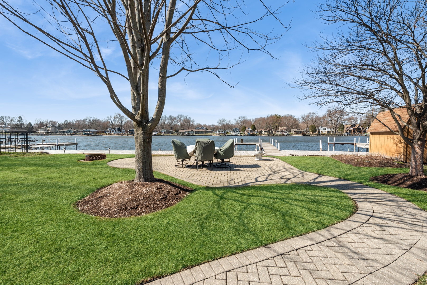 307 North Emerald Drive McHenry, IL 60051 - Photo 5 of 34 a view of a garden with a table and chairs