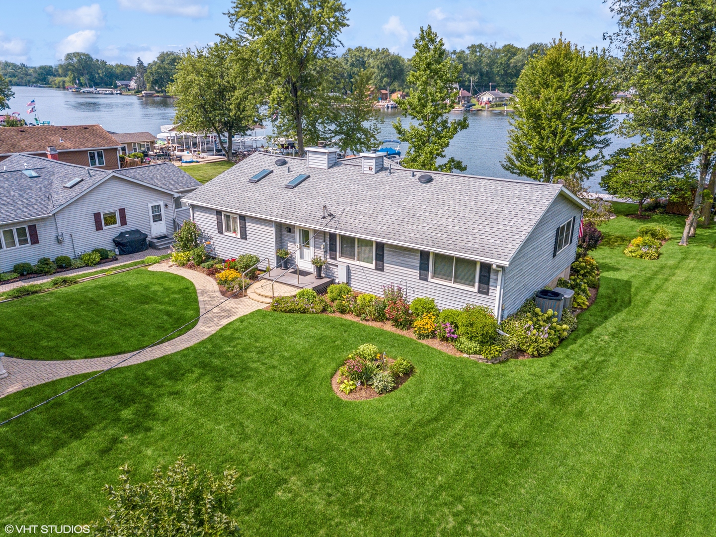 307 North Emerald Drive McHenry, IL 60051 - Photo 8 of 34 an aerial view of a house with garden space and street view
