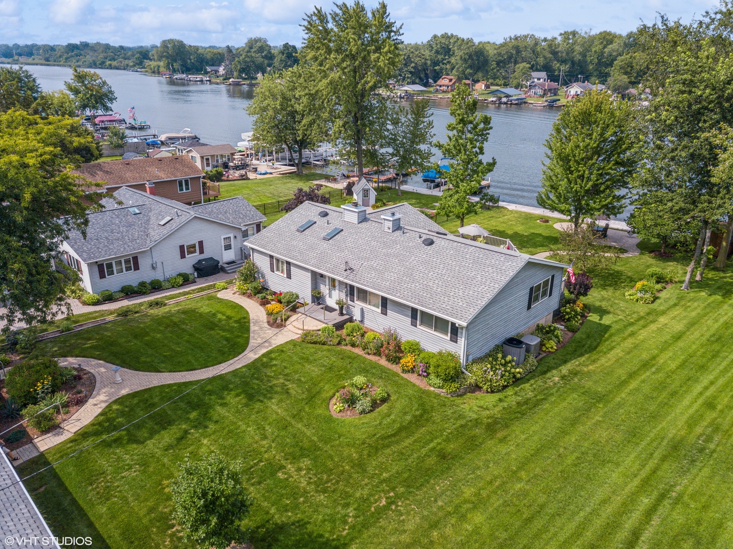 307 North Emerald Drive McHenry, IL 60051 - Photo 9 of 34 an aerial view of a house with pool and a yard