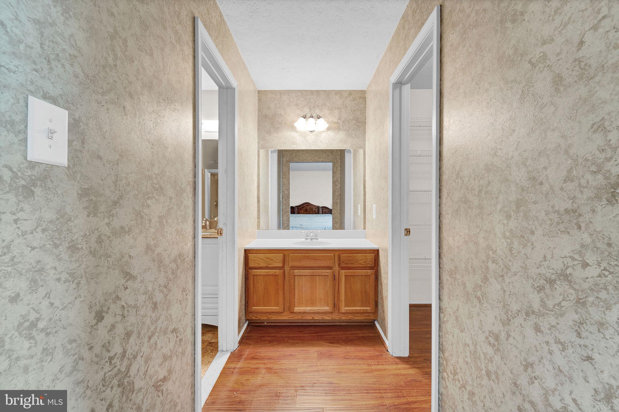 310 Moonseed Place Mount Laurel, NJ 08054 - Photo 17 of 27 a view of a bathroom from a hallway