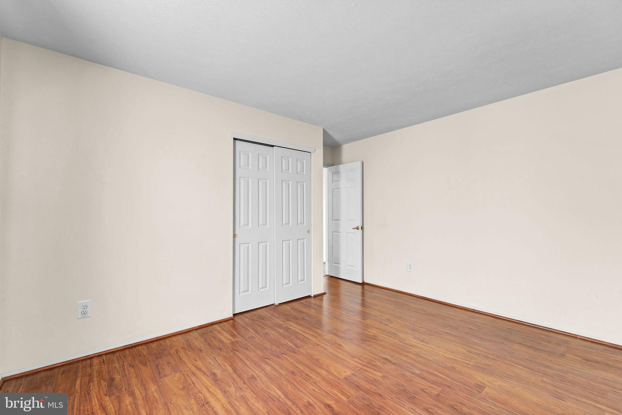 310 Moonseed Place Mount Laurel, NJ 08054 - Photo 20 of 27 a view of an empty room with wooden floor