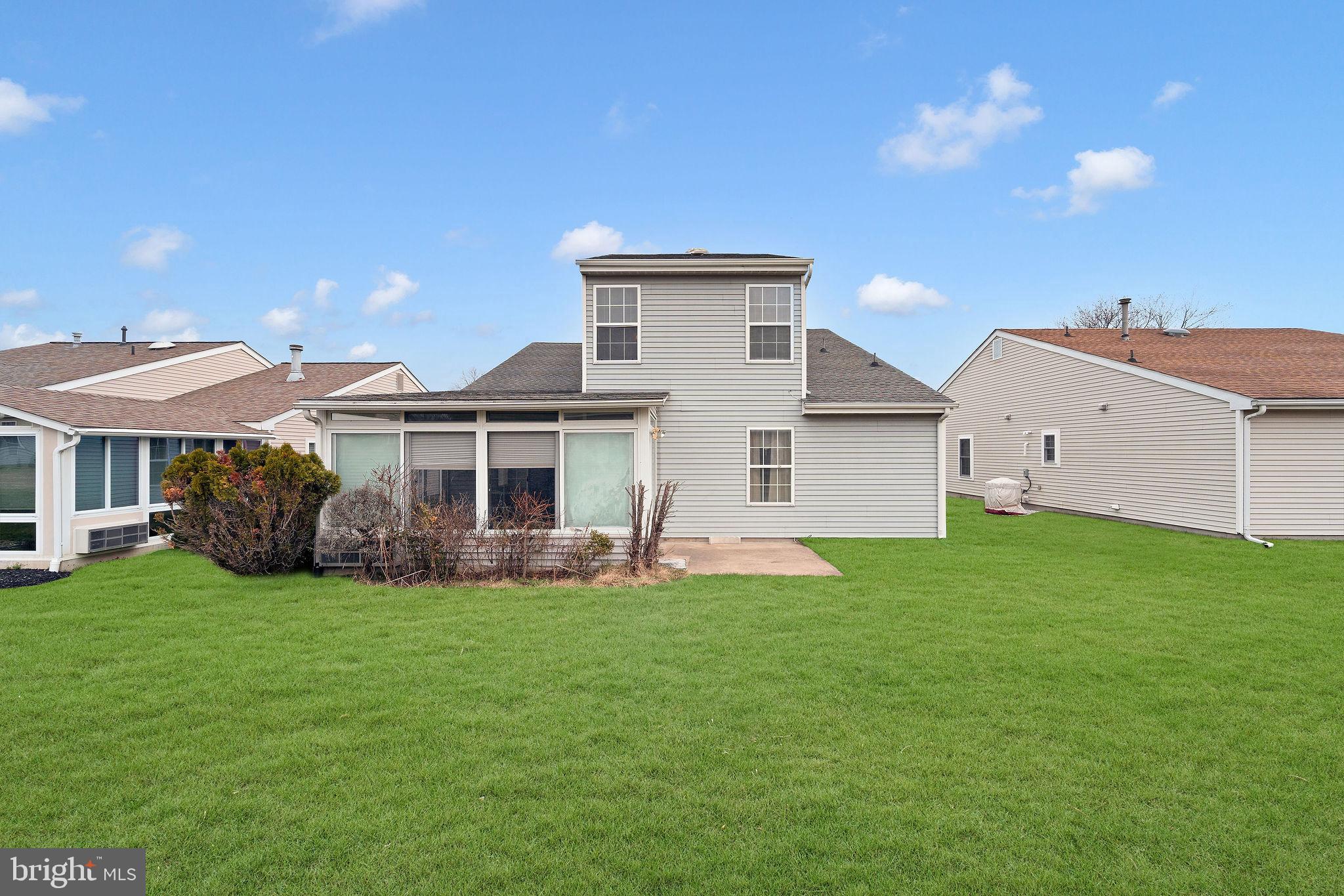 310 Moonseed Place Mount Laurel, NJ 08054 - Photo 26 of 27 a view of a house with a yard and sitting area