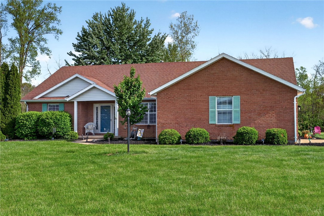 4996 Shannon Avenue Springfield, OH 45504 - Photo 48 of 61 This classic brick residence with a welcoming porch offers timeless appeal and comfort.