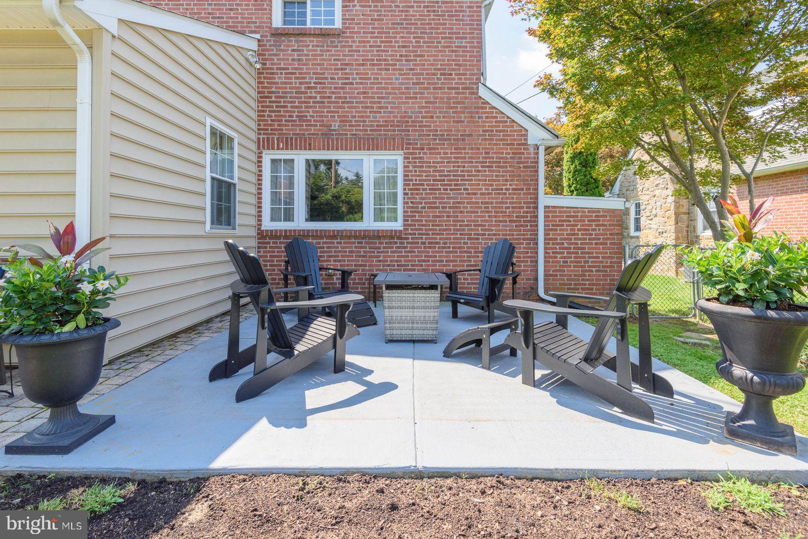 620 Laurel Road Springfield, PA 19064 - Photo 23 of 25 a view of a backyard with sitting area