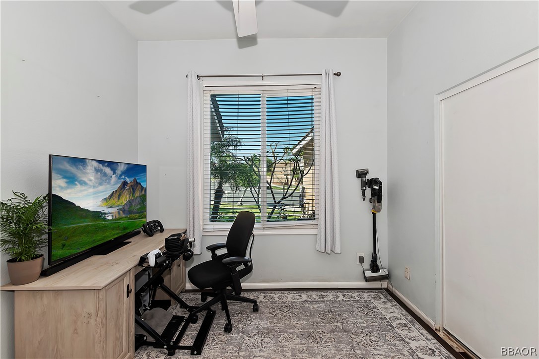 2201 Wagon Train Street Corona, CA 92878 - Photo 14 of 24 a view of a workspace with furniture and a window