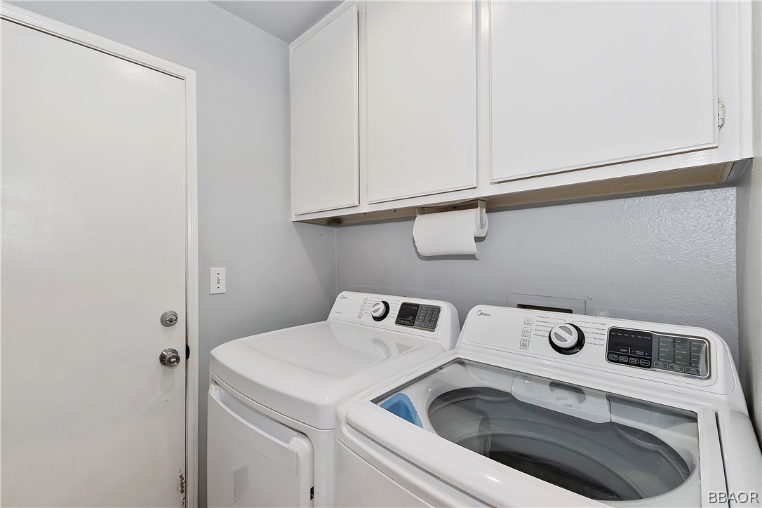 2201 Wagon Train Street Corona, CA 92878 - Photo 16 of 24 a utility room with dryer and washer
