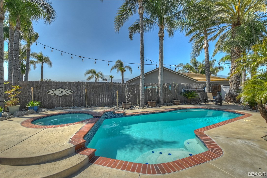 2201 Wagon Train Street Corona, CA 92878 - Photo 18 of 24 a view of a house with swimming pool