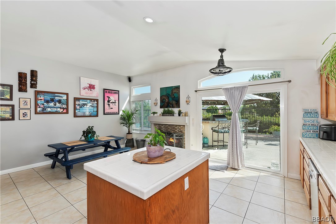 2201 Wagon Train Street Corona, CA 92878 - Photo 8 of 24 a view of a workspace with furniture and a kitchen