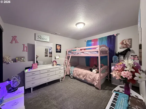 a bedroom with furniture and a couch