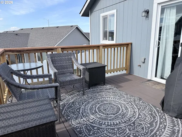 a view of balcony with furniture
