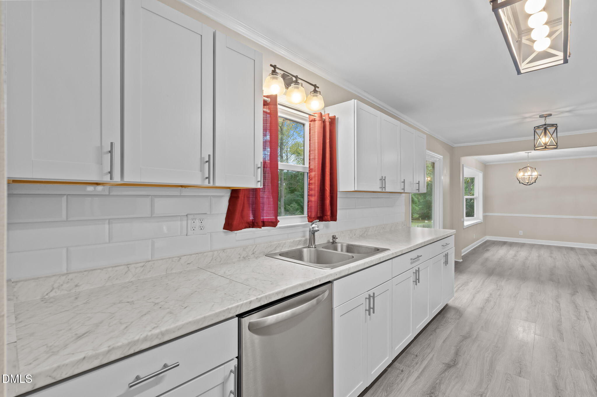804 West Scotsdale Road Laurinburg, NC 28352 - Photo 14 of 41 a kitchen with a sink and a window