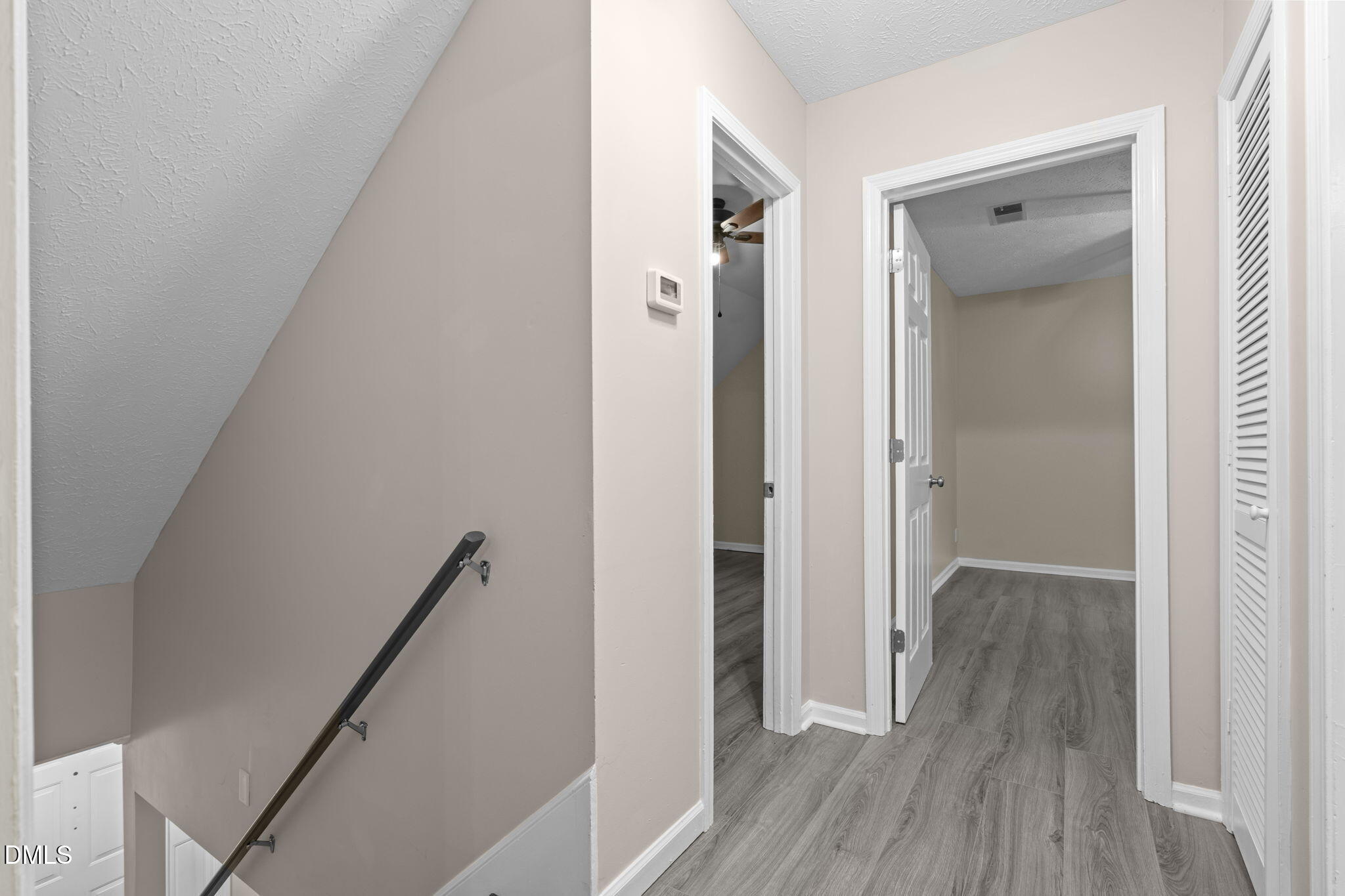 804 West Scotsdale Road Laurinburg, NC 28352 - Photo 22 of 41 a view of hallway with wooden floor